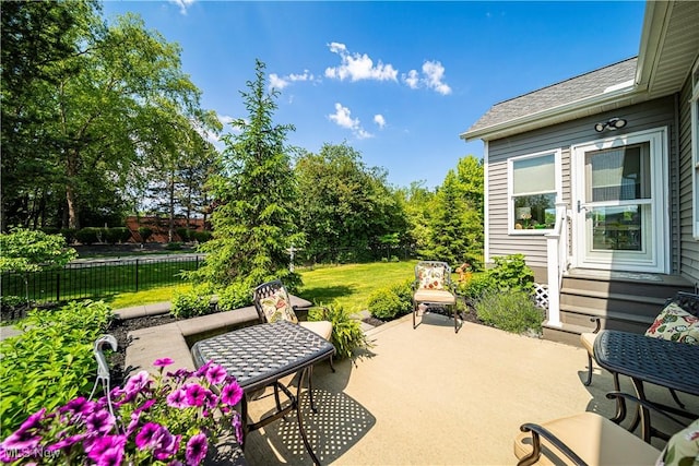 view of patio with fence