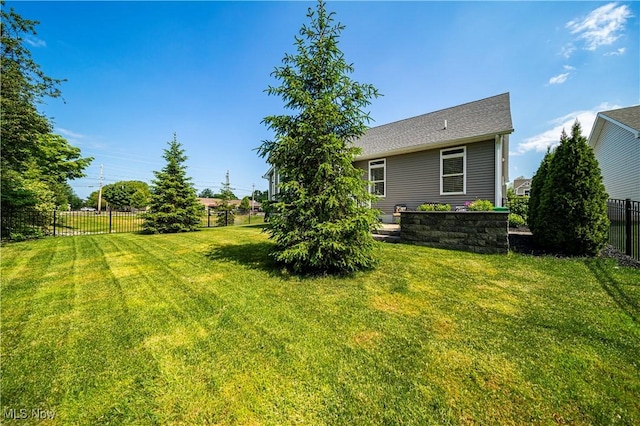 view of yard featuring fence