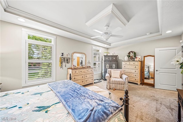 bedroom with crown molding, recessed lighting, a raised ceiling, light colored carpet, and a ceiling fan