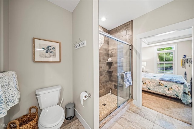 bathroom with baseboards, ensuite bath, toilet, and a shower stall