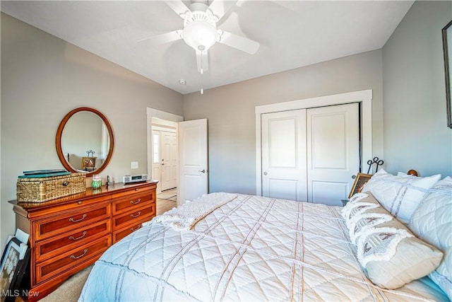 bedroom featuring a closet, carpet flooring, and ceiling fan