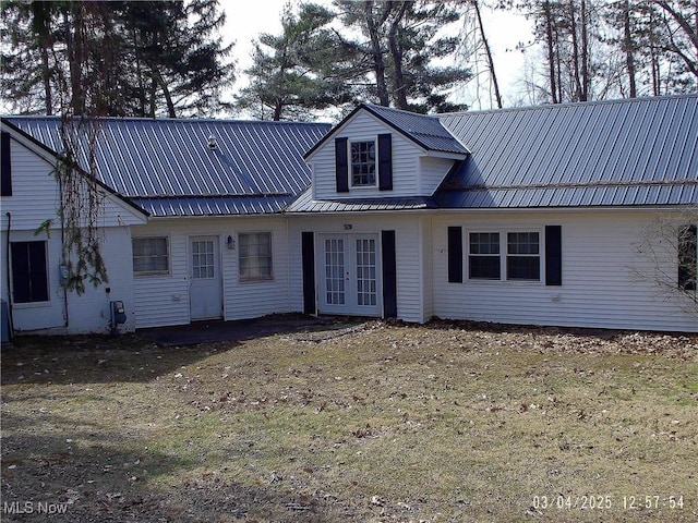 view of front of house featuring metal roof and french doors