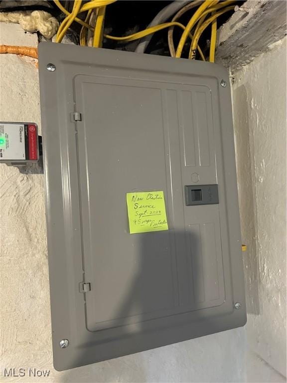 utility room featuring electric panel