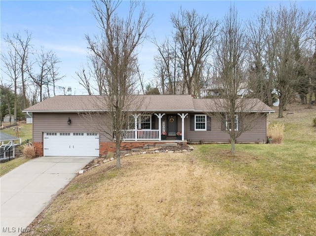 single story home featuring a porch, an attached garage, concrete driveway, roof with shingles, and a front yard