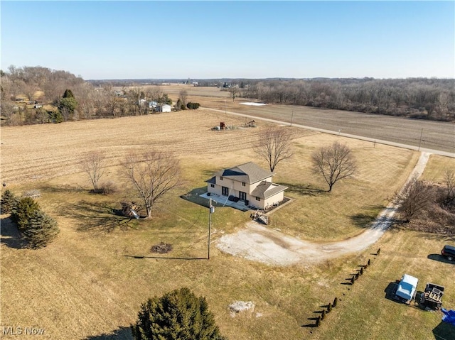 birds eye view of property with a rural view