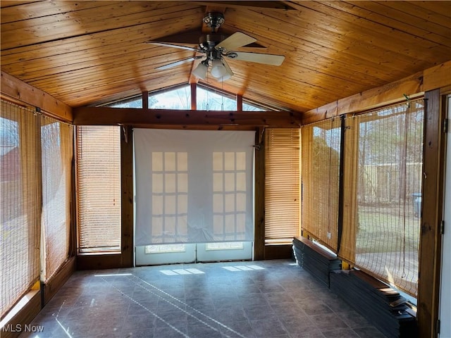 unfurnished sunroom featuring lofted ceiling, plenty of natural light, and wood ceiling