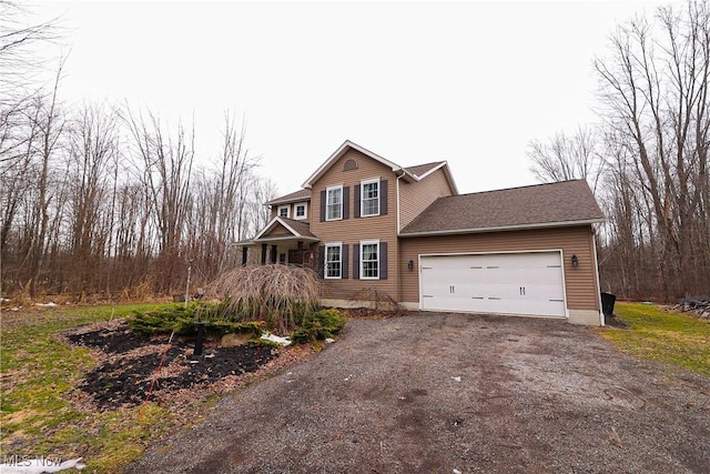 view of front of house with a garage and driveway