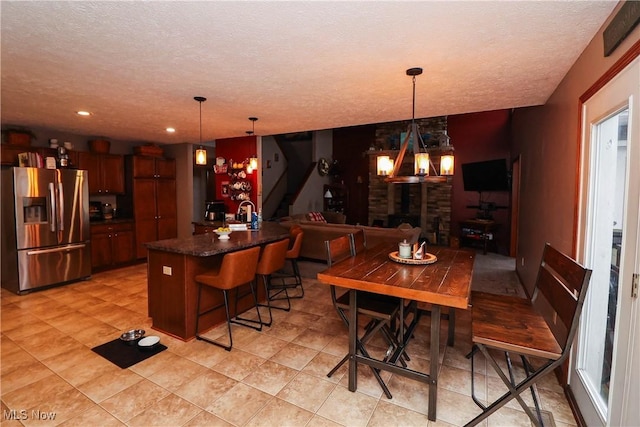 interior space featuring a textured ceiling and recessed lighting