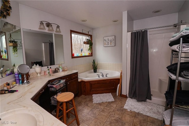 full bath with tile patterned floors, a shower stall, vanity, and a bath