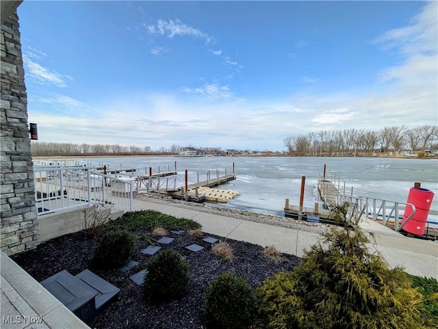 dock area featuring a water view