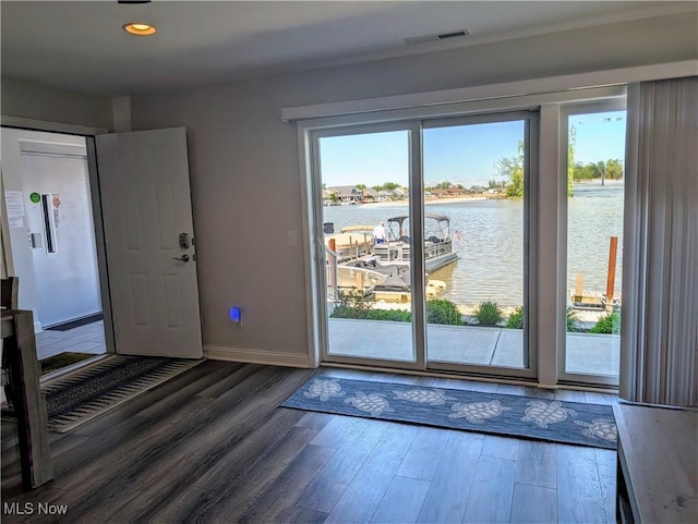 2568 S Waterside Ct Unit 211, Lakeside-Marblehead, OH 43440 - entryway featuring a water view, wood finished floors, baseboards, and recessed lighting