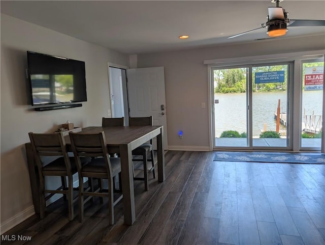 2568 S Waterside Ct Unit 211, Lakeside-Marblehead, OH 43440 - dining area featuring baseboards, dark wood-style flooring, recessed lighting, a water view, and ceiling fan