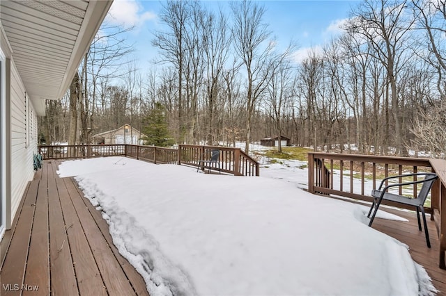 view of snow covered deck