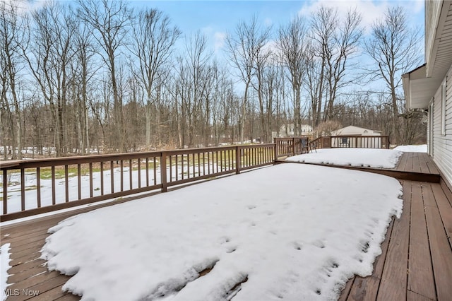 view of snow covered deck