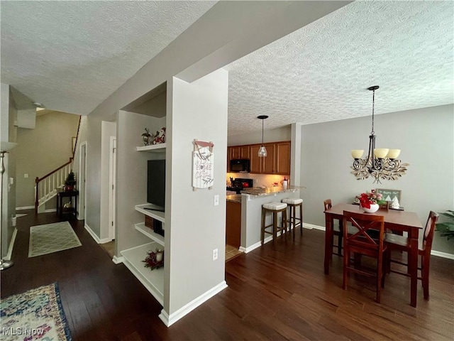 dining room with baseboards, stairway, dark wood-style flooring, a textured ceiling, and a notable chandelier