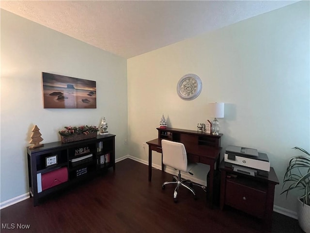 office featuring wood finished floors and baseboards