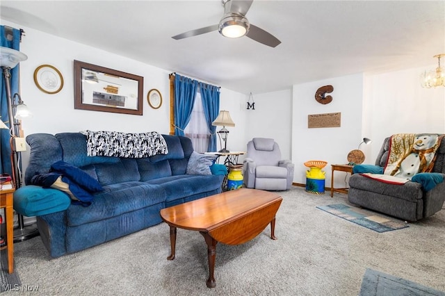 carpeted living area featuring ceiling fan