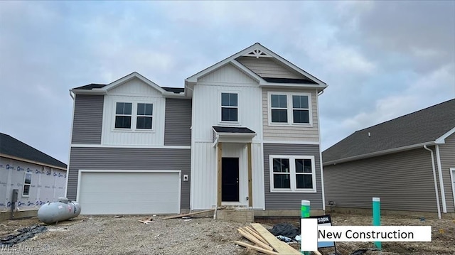 view of front of home featuring board and batten siding and a garage