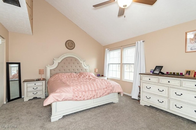 bedroom featuring ceiling fan, light carpet, visible vents, baseboards, and vaulted ceiling