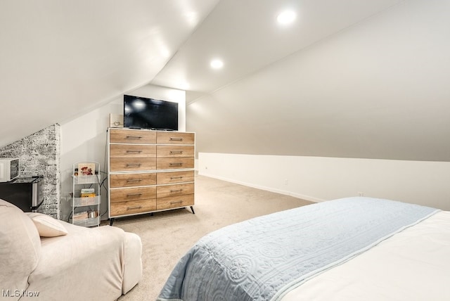 bedroom featuring light carpet, recessed lighting, baseboards, and lofted ceiling