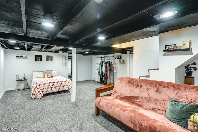 carpeted bedroom featuring baseboards