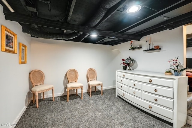 living area with carpet floors and baseboards