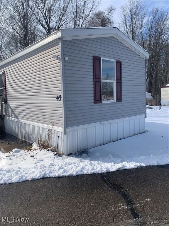 view of snow covered property