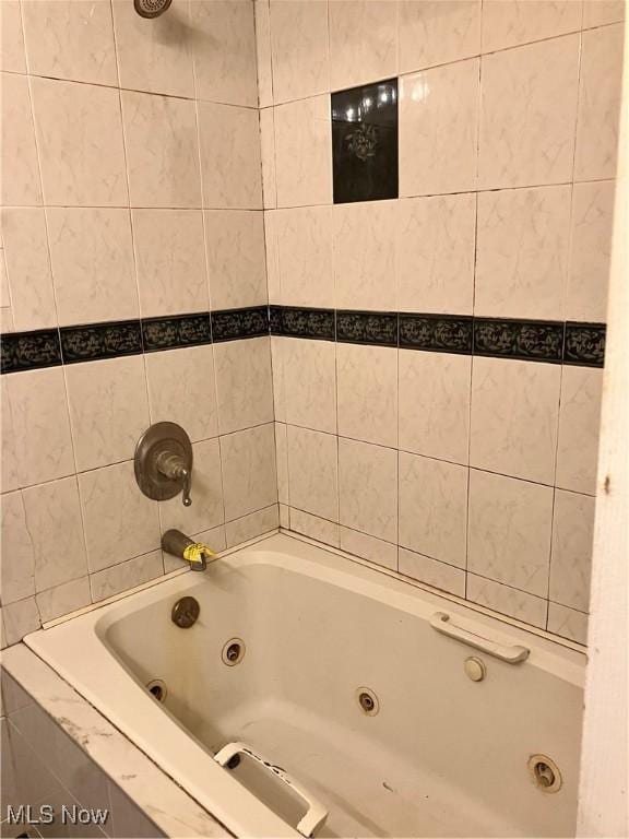 full bathroom with a combined bath / shower with jetted tub