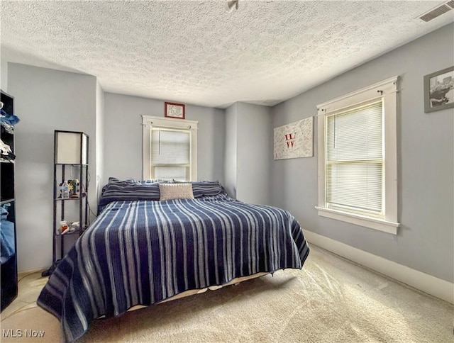 328 Scott Ave, Niles, OH 44446 - bedroom featuring carpet floors, a textured ceiling, and baseboards