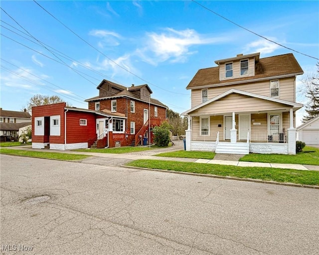 328 Scott Ave, Niles, OH 44446 - traditional style home featuring a porch