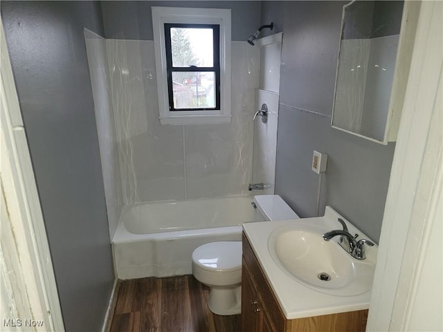 328 Scott Ave, Niles, OH 44446 - full bathroom with toilet, wood finished floors, vanity, and shower / tub combination