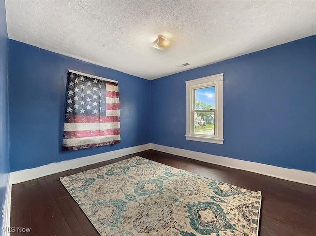 328 Scott Ave, Niles, OH 44446 - unfurnished room with a textured ceiling and wood finished floors
