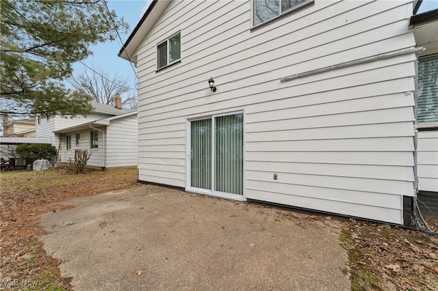 back of property with a patio area