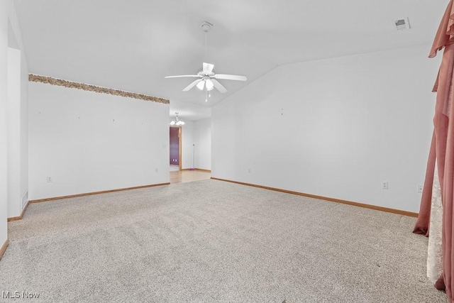 spare room with lofted ceiling, light carpet, baseboards, and ceiling fan with notable chandelier