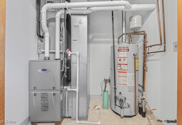 utility room featuring water heater