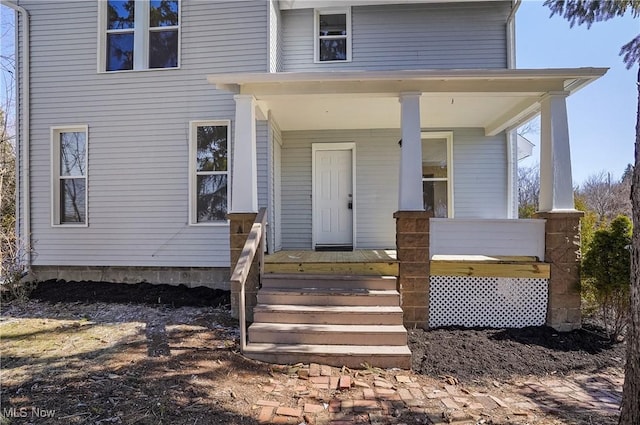 property entrance with a porch