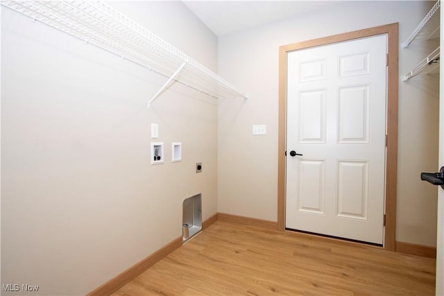 clothes washing area featuring laundry area, washer hookup, baseboards, light wood finished floors, and electric dryer hookup