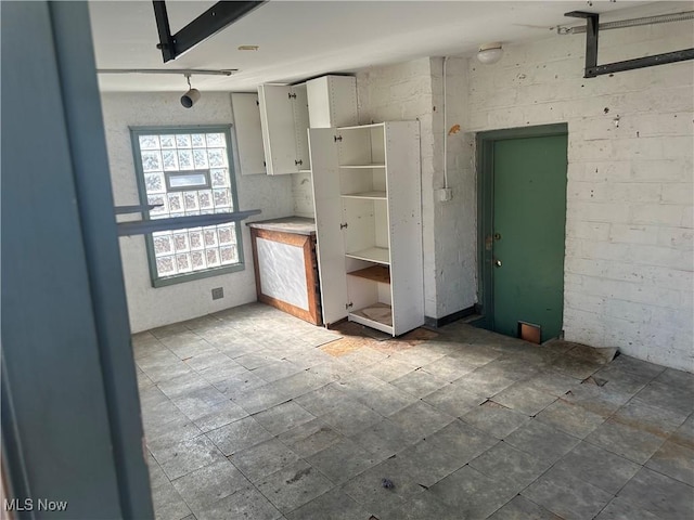 kitchen with white cabinets