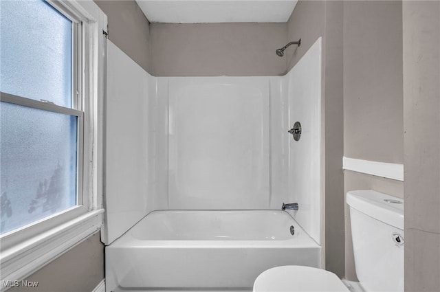 full bath featuring bathtub / shower combination and toilet