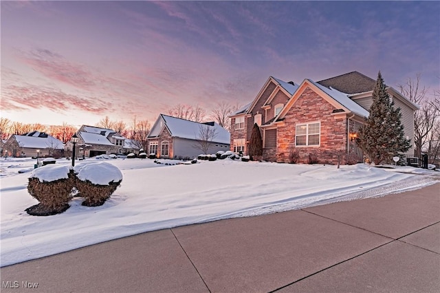 exterior space with stone siding