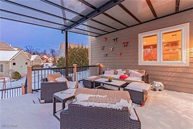 view of patio featuring fence and an outdoor hangout area