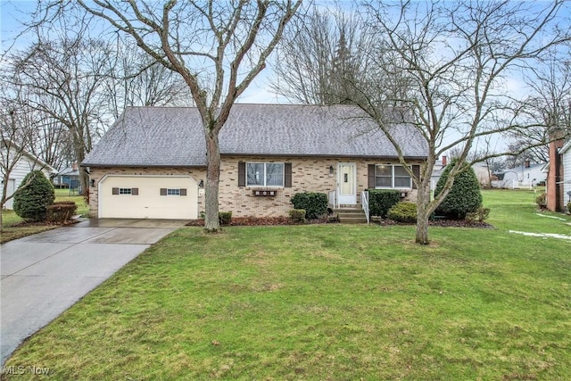 ranch-style home with a garage, a front yard, concrete driveway, and a shingled roof