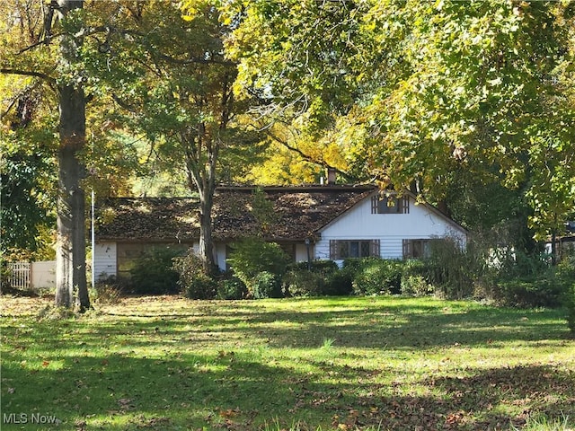 view of front of home with a front yard