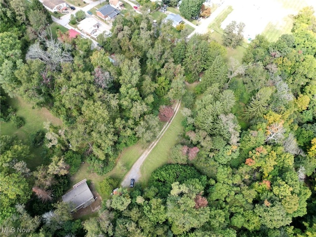 aerial view featuring a forest view