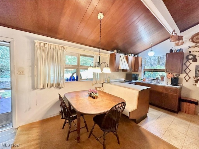 kitchen with black appliances, wood ceiling, vaulted ceiling, and decorative light fixtures