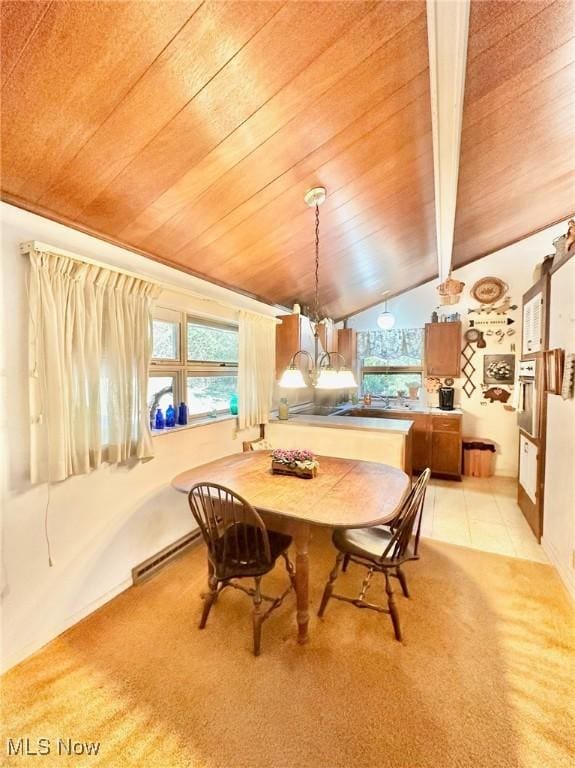 dining space featuring wood ceiling, light colored carpet, lofted ceiling with beams, and light tile patterned flooring