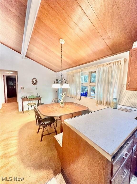 interior space featuring a chandelier, wooden ceiling, light colored carpet, and lofted ceiling with beams