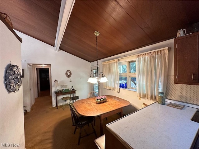 dining room with vaulted ceiling with beams, a chandelier, wood ceiling, and light colored carpet