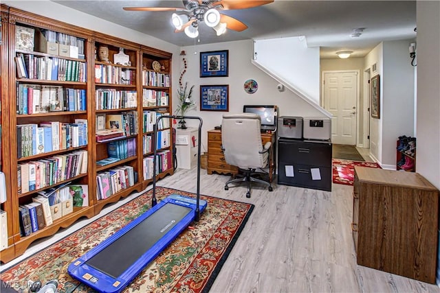 office with ceiling fan and wood finished floors