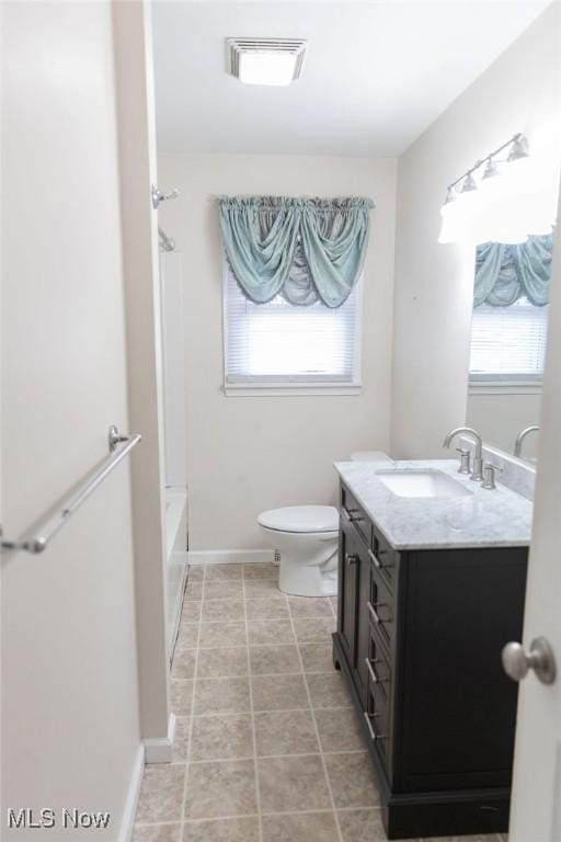 full bathroom with visible vents, plenty of natural light, vanity, and toilet